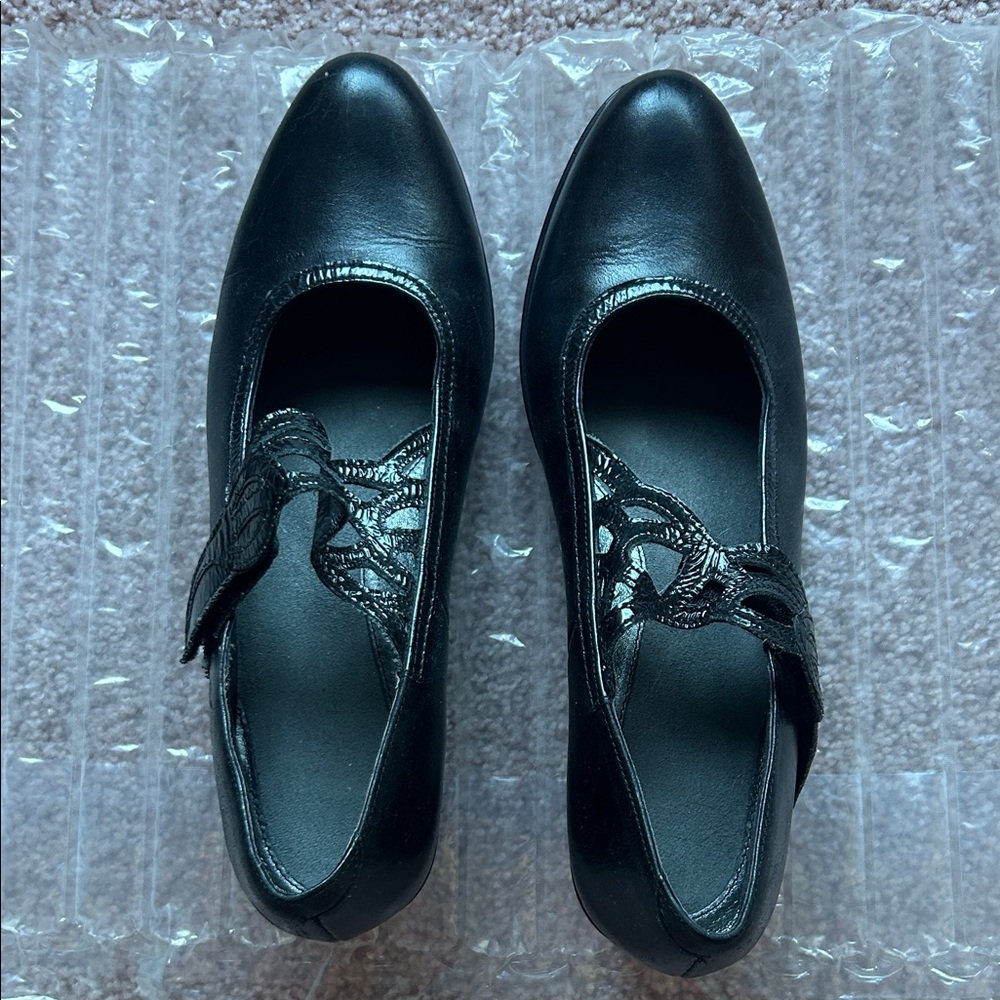 NWOT.  Naot Women's Black Leather Mary Jane Heels with Decorative Straps.